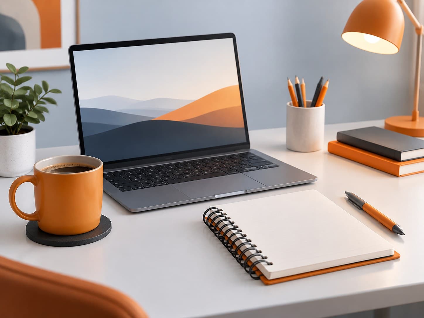 Illustration of a desk with a laptop, a coffee mug and a spiral-bound interview notebook, representing TCS interview questions